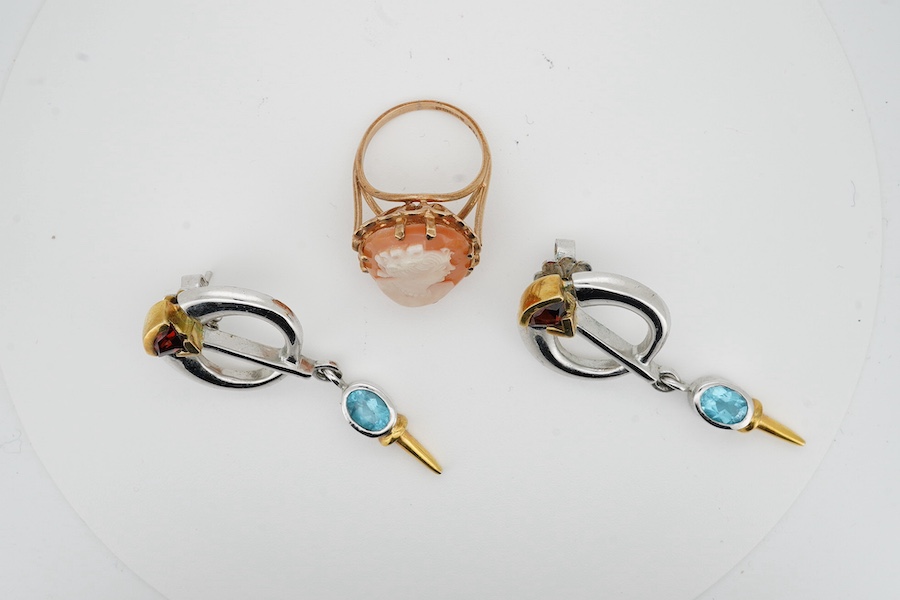 A 9ct gold shell cameo ring, size N, British hallmarks, gross weight 6 grams, and a pair of blue topaz and earrings, mounted in silver, length 5.1cm each, post fittings, Condition: good